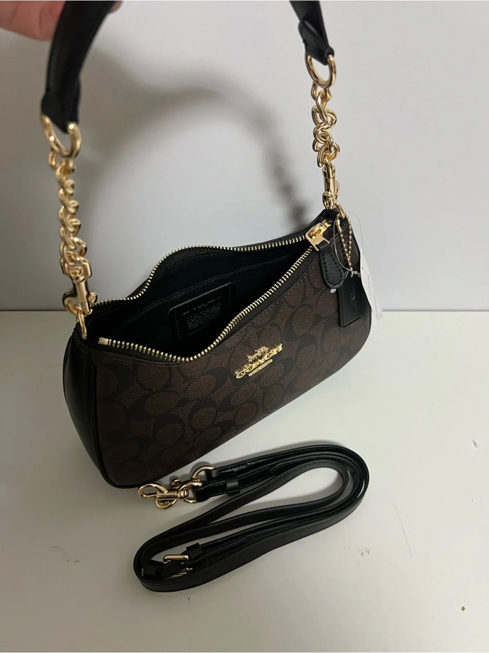 Coach Brown Signature Canvas Shoulder Bag with Black Trim and Gold Hardware